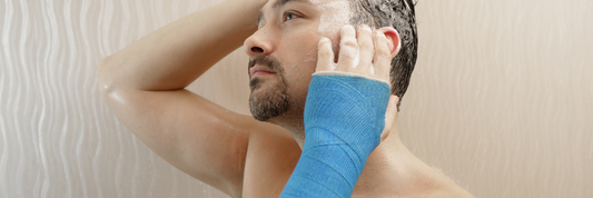 Can I take baths instead of showers with my cast or bandage?