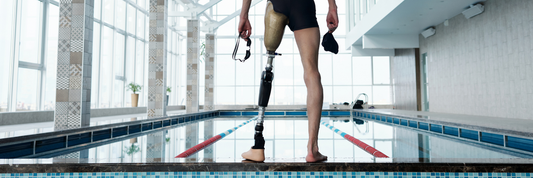 Can I swim or bathe with my prosthetic limb on? How do I ensure it stays dry?